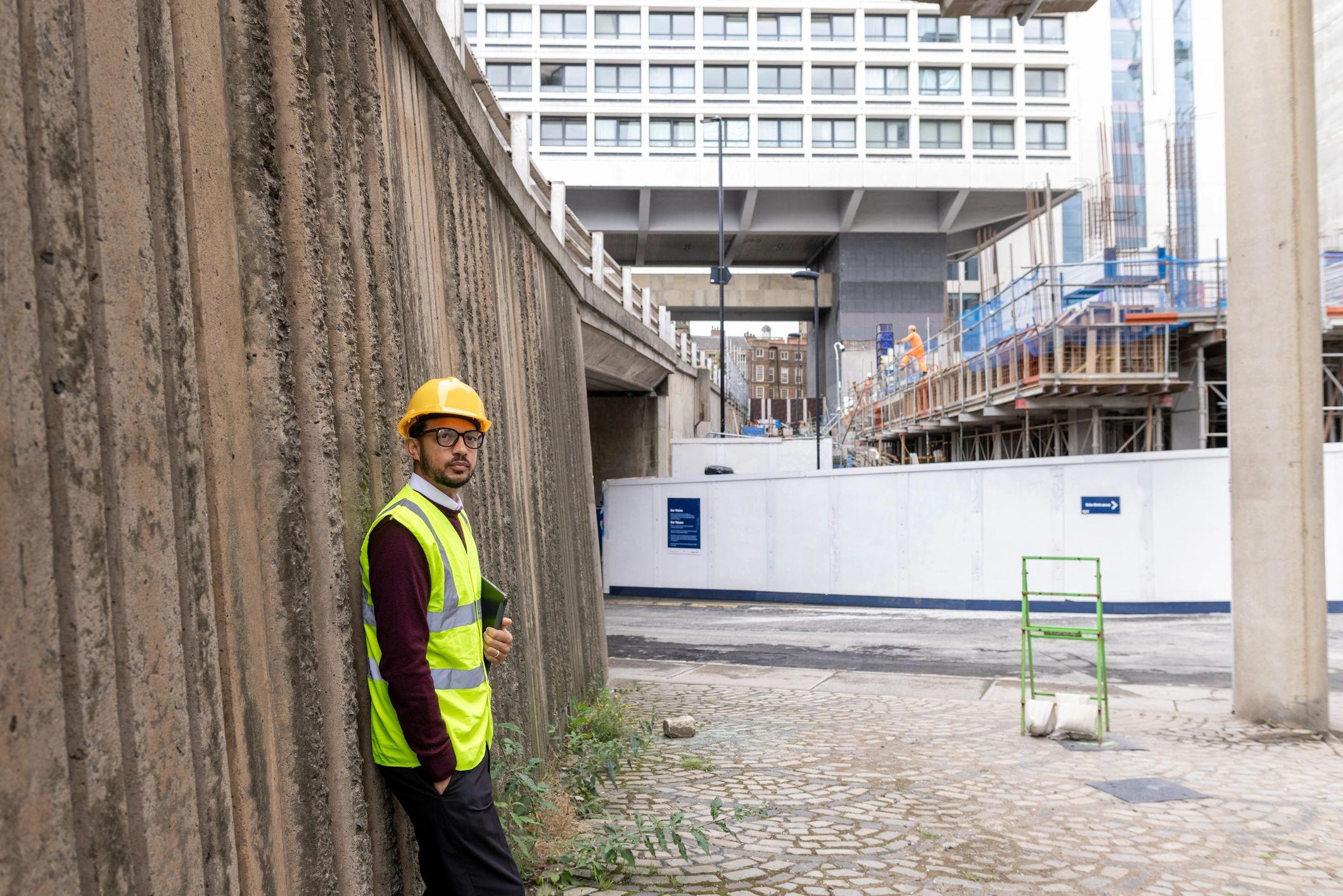 Professional at a construction site with safety gear